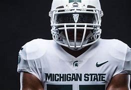 Image result for Michigan State White Football Helmets