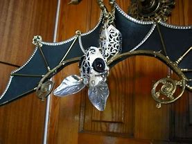 Image result for Metal Hanging Bat Sculpture