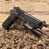 Image result for Beretta M9 Tactical