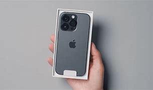 Image result for iPhone 14 Picture in Black Hand