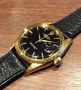 Image result for Rolex Oyster Perpetual Swiss Made 18K