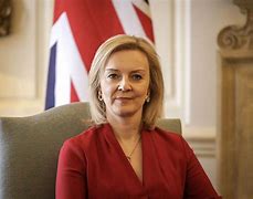 Image result for Liz Truss Red Dress