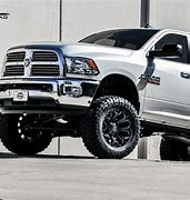 Image result for Ram 2500 4 Inch Lift with Black Rims