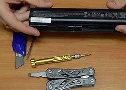 Image result for Laptop Battery in Hand