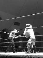 Image result for Men in Wrestling Uniforms