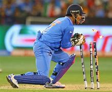 Image result for MS Dhoni Wicket Keeping Poster A4 Size