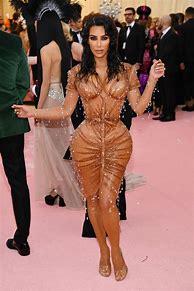 Image result for Kim Kardashian Gold Skirt