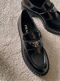 Image result for Real vs Fake Prada Shoes