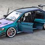 Image result for Mitsubishi Lancer EVO 7 Modified