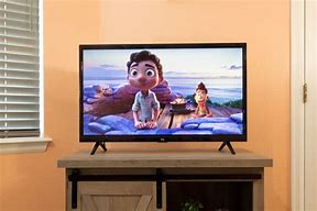 Image result for 32 Inch Smart TV Infront to Man