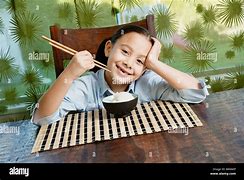 Image result for Girl Eating Rice