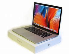 Image result for Picture of a Aplle Laptop Computer
