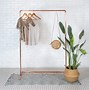 Image result for Wall Mounted Clothes Rack with Shelf