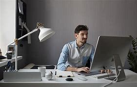 Image result for Person at Computer Desk
