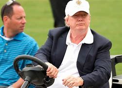 Image result for Trump Driving Golf Cart On Green