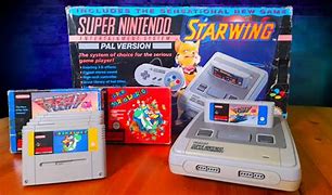 Image result for SNES Console with Game Inserted