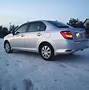 Image result for Toyota Corolla Axio Hybrid 2016 Car