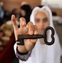 Image result for Woman Holding Rusted Key