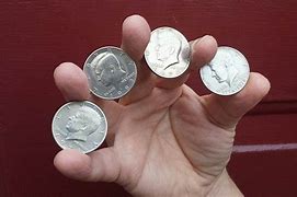 Image result for Magician Coin Trick