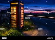 Image result for Red Telephone Booth at Night