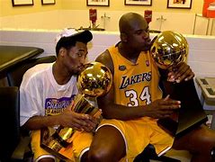 Image result for Kobe Sitting with Trophy