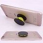 Image result for What Is a Pop Socket for Phone