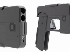 Image result for Pistol On a Table Phone Photo