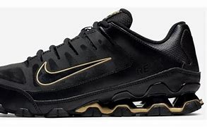 Image result for Black and Gold Nike's