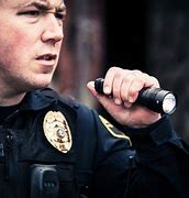 Image result for Police Officer Flashlight