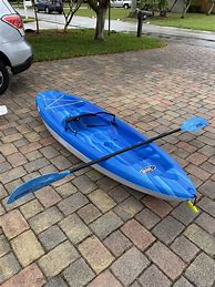 Image result for Pelican Bandit NXT 100 Kayak, Fade Red Yellow