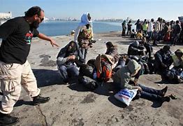 Image result for African Migrants Caught in Tail Fin Ship