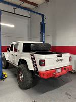 Image result for Jeep Gladiator Tire Rack