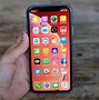Image result for iPhone XR in Hand Pic