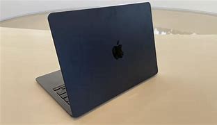 Image result for Space Black vs Midnight MacBook
