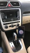 Image result for VW Driver Seat Cell Phone