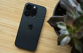 Image result for iPhone 15 in Blck Hand