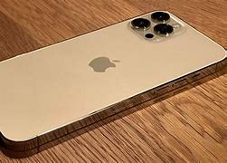 Image result for iPhone 14 On a White Table