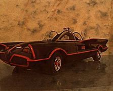 Image result for Black and Yellow Batmobile