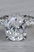 Image result for 2 Carat Oval Diamond Ring with Platinum Band