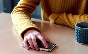 Image result for Person Placing Phone On Table