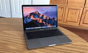 Image result for Apple MacBook Pro Touch Bar 2017