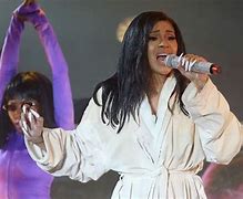 Image result for Cardi B Costume Rips On Stage