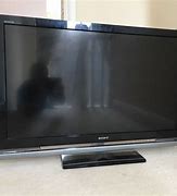 Image result for Sony Bravia TV with Buitl in Stand