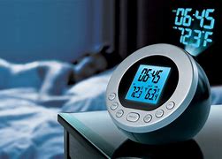 Image result for Sharper Image Robot Alarm Clock
