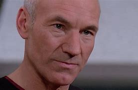 Image result for Captain Picard with Birthday Cake Lit Candles