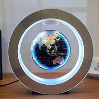 Image result for Light-Up Spinning Globe Speaker