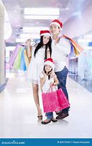 Image result for Family in a Mall with Shopping Bags