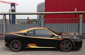 Image result for Matte Black Ferrari Gold