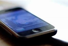 Image result for Cell Phone On Table Ringing Vibrating