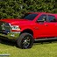 Image result for Jacked Up 2500 Ram Red